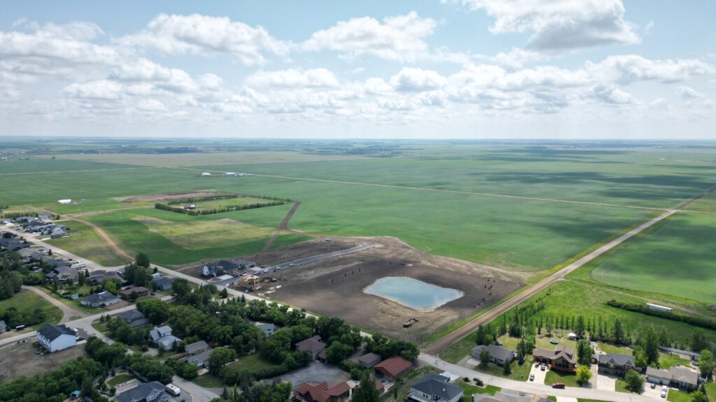 Overhead Picture of The Country Development and Park Showing green fields and progress